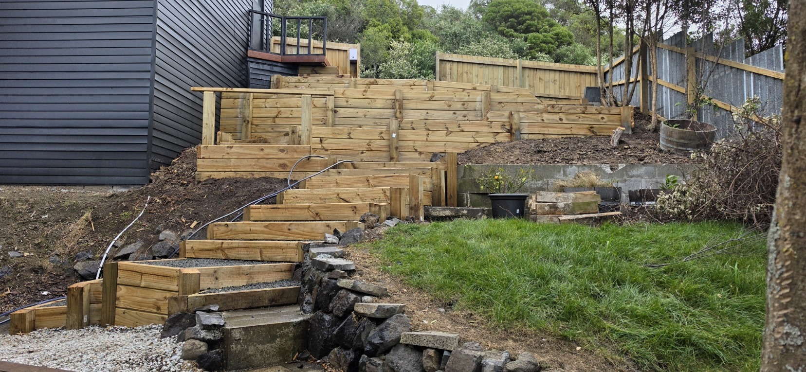 Large timber sleeper retaining structure and garden steps